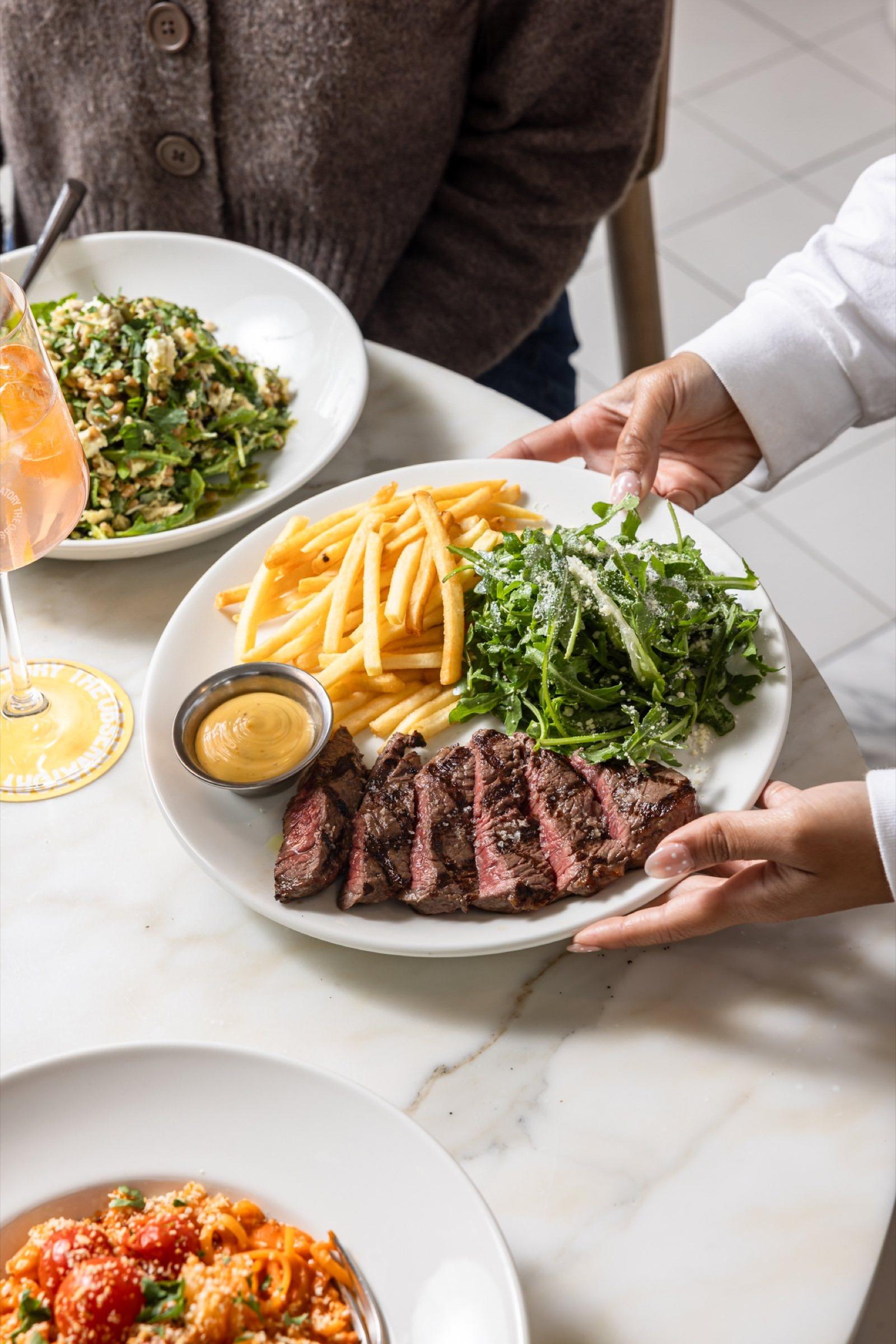 Steak frites being served at The Observatory