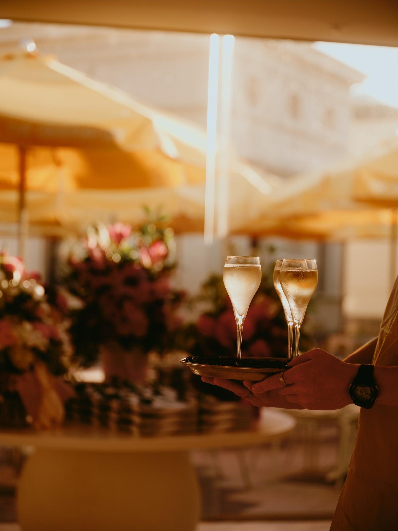 Champagne poured for guests at an event at The Observatory
